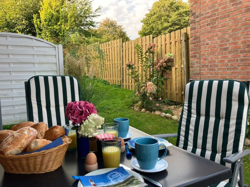 Wohnzimmer Ferienwohnung Schönhagen mit Terrassenzugang
